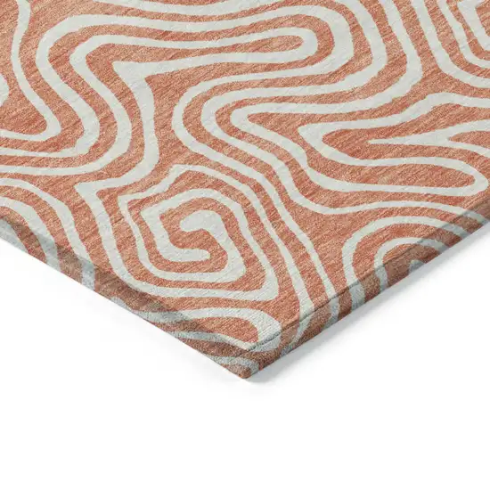 Salmon And Ivory Abstract Washable Indoor Outdoor Area Rug Photo 4