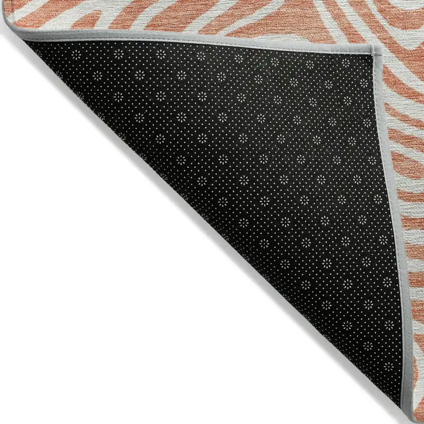 Salmon And Ivory Abstract Washable Indoor Outdoor Area Rug Photo 3