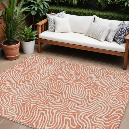 Salmon And Ivory Abstract Washable Indoor Outdoor Area Rug Photo 1