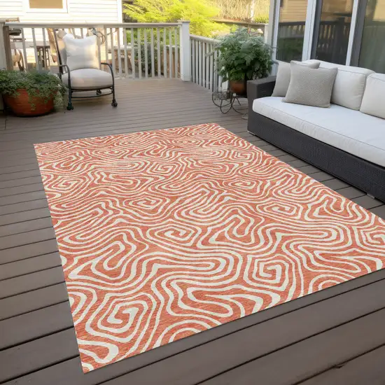 Salmon And Ivory Abstract Washable Indoor Outdoor Area Rug Photo 9