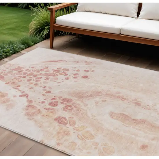 Salmon And Ivory Abstract Washable Indoor Outdoor Area Rug Photo 2