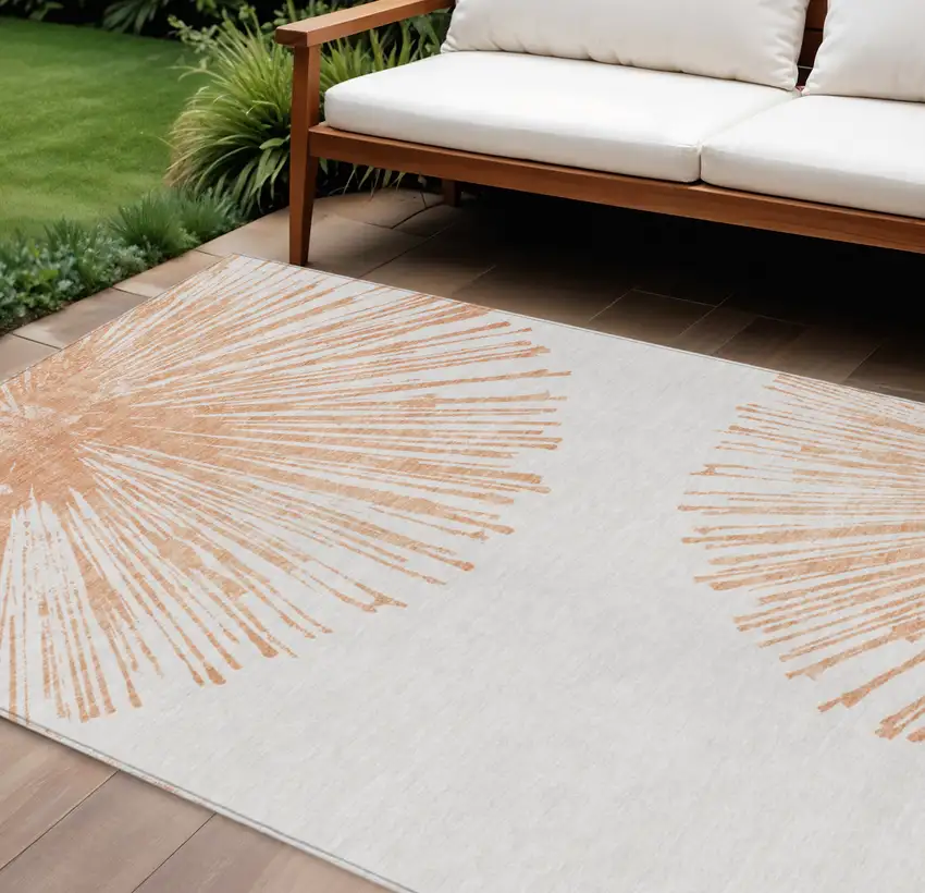 Salmon And Ivory Abstract Washable Indoor Outdoor Area Rug Photo 1