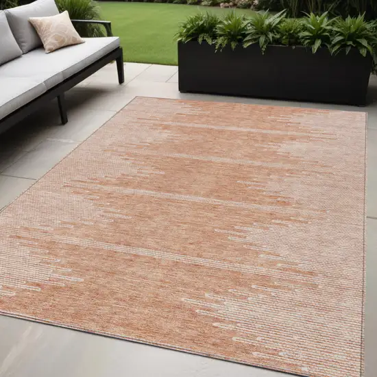 Salmon And Ivory Abstract Washable Indoor Outdoor Area Rug Photo 1