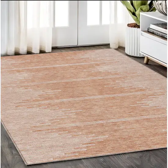 Salmon And Ivory Abstract Washable Indoor Outdoor Area Rug Photo 9