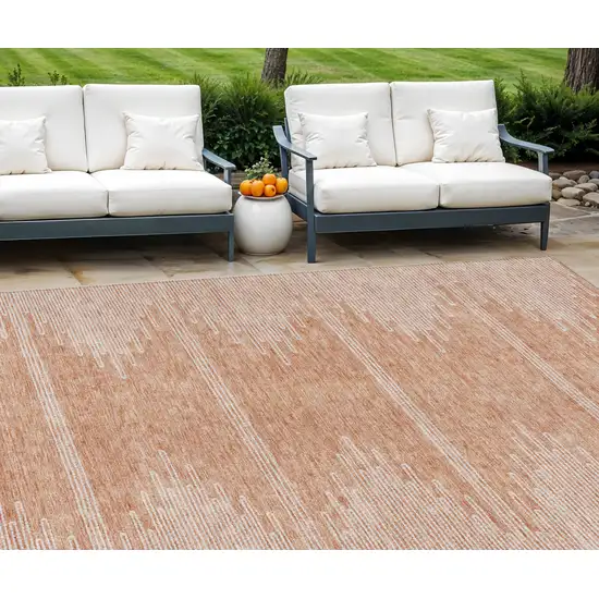 Salmon And Ivory Abstract Washable Indoor Outdoor Area Rug Photo 1