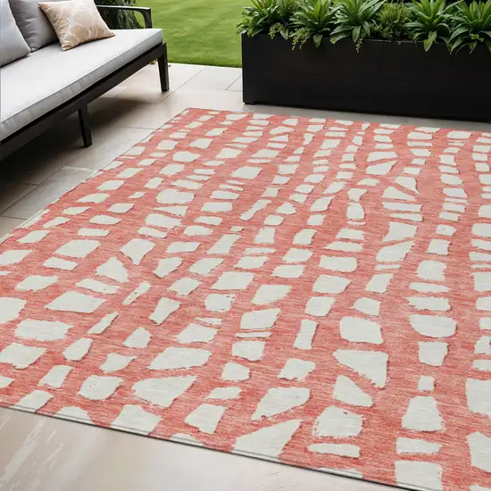 Salmon And Ivory Abstract Washable Indoor Outdoor Area Rug Photo 1