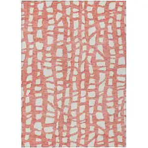 Photo of Salmon And Ivory Abstract Washable Indoor Outdoor Area Rug