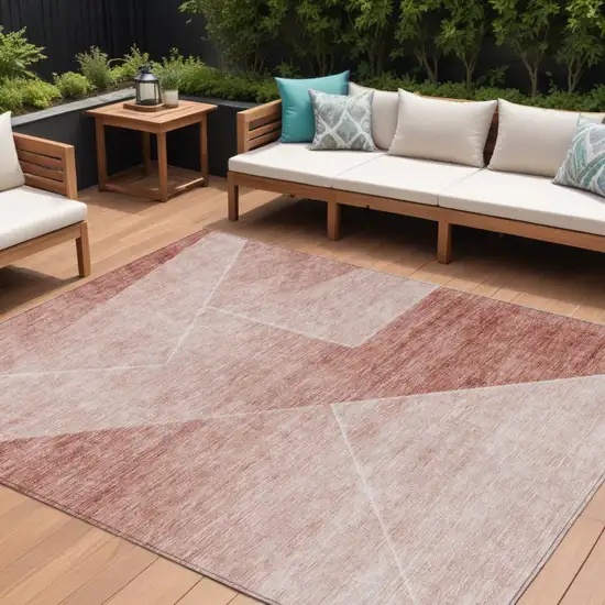 Salmon And Ivory Abstract Washable Indoor Outdoor Area Rug Photo 1