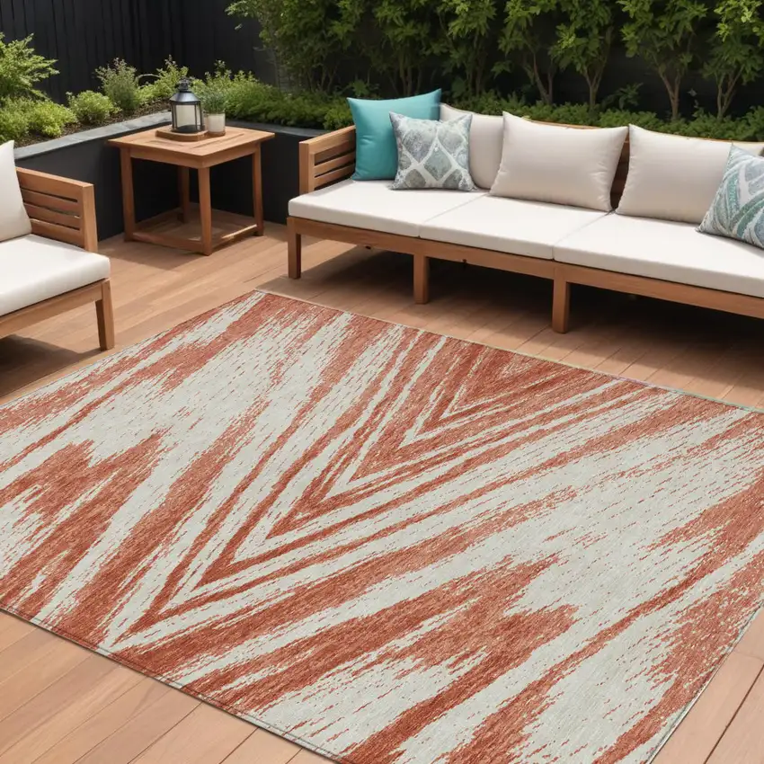 Salmon And Ivory Abstract Washable Indoor Outdoor Area Rug Photo 1