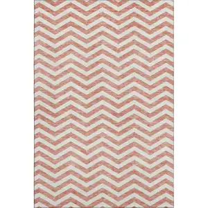 Photo of Salmon And Ivory Chevron Washable Area Rug With UV Protection