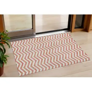 Photo of Salmon And Ivory Chevron Washable Indoor Outdoor Area Rug