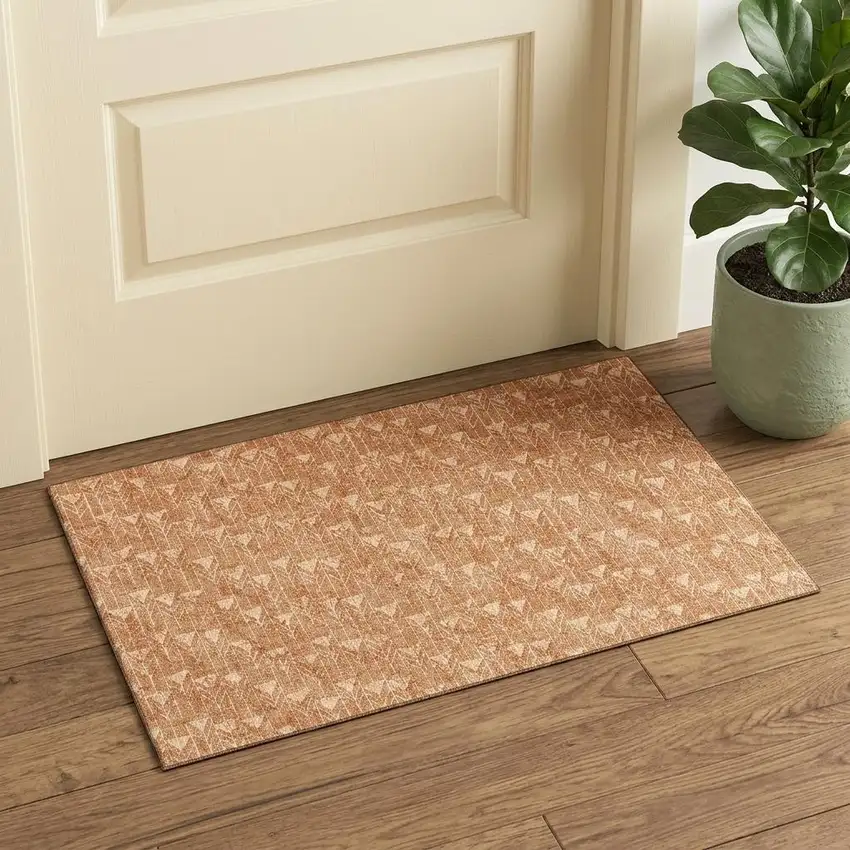 Salmon And Ivory Geometric Washable Area Rug With UV Protection Photo 1