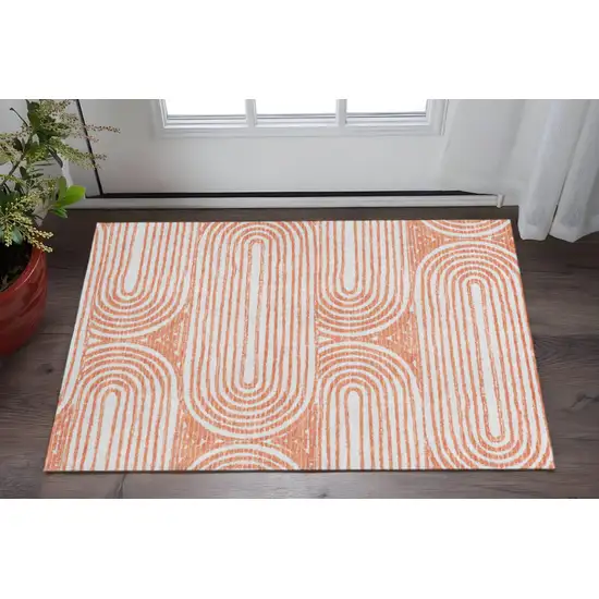 Salmon And Ivory Geometric Washable Area Rug With UV Protection Photo 3