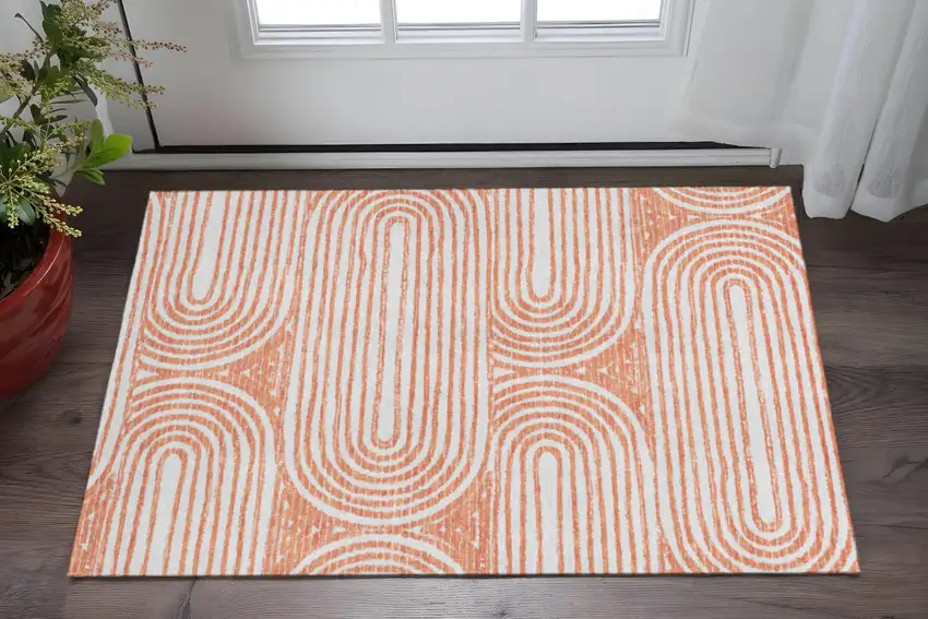 Salmon And Ivory Geometric Washable Area Rug With UV Protection Photo 3