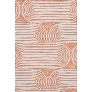 Photo of Salmon And Ivory Geometric Washable Area Rug With UV Protection