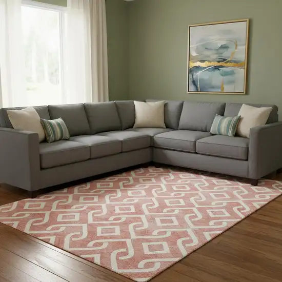 Salmon And Ivory Geometric Washable Area Rug With UV Protection Photo 1