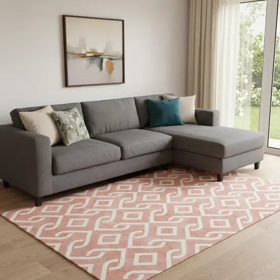 Salmon And Ivory Geometric Washable Area Rug With UV Protection Photo 1