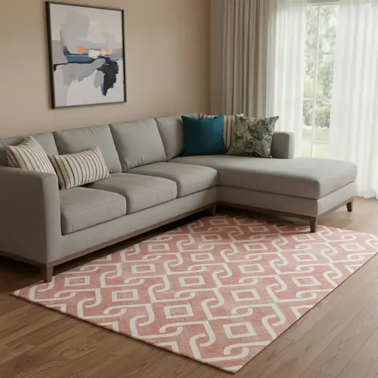 Salmon And Ivory Geometric Washable Area Rug With UV Protection Photo 1