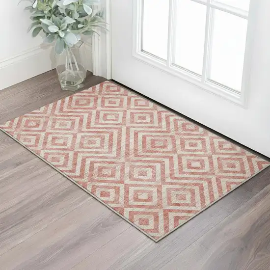 Salmon And Ivory Geometric Washable Area Rug With UV Protection Photo 2