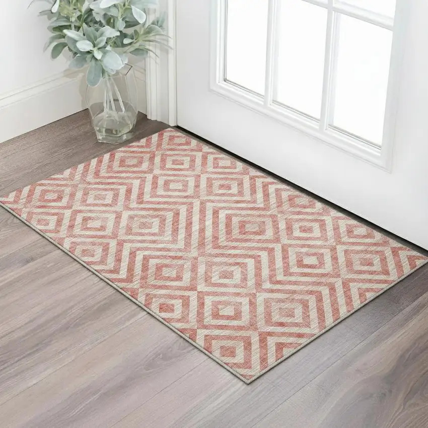 Salmon And Ivory Geometric Washable Area Rug With UV Protection Photo 2