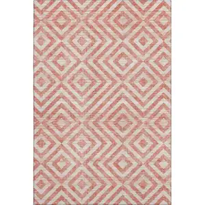 Photo of Salmon And Ivory Geometric Washable Area Rug With UV Protection