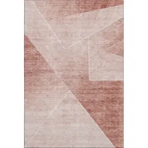 Photo of Salmon And Ivory Geometric Washable Area Rug With UV Protection