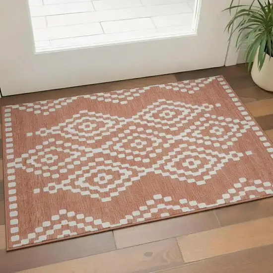 Salmon And Ivory Geometric Washable Area Rug With UV Protection Photo 1