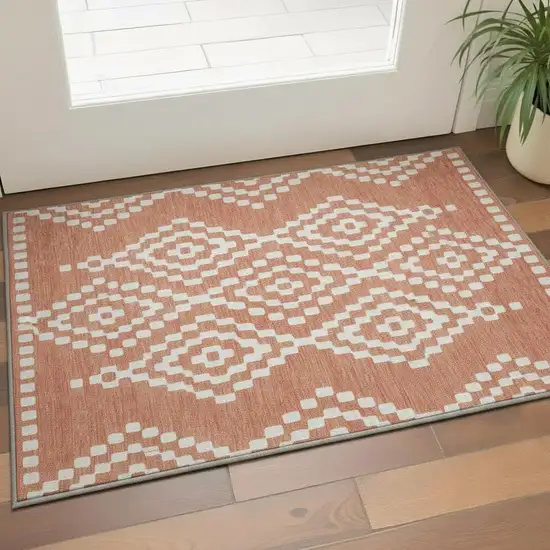 Salmon And Ivory Geometric Washable Area Rug With UV Protection Photo 2