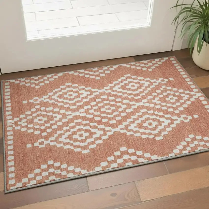 Salmon And Ivory Geometric Washable Area Rug With UV Protection Photo 2