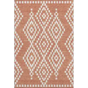 Photo of Salmon And Ivory Geometric Washable Area Rug With UV Protection