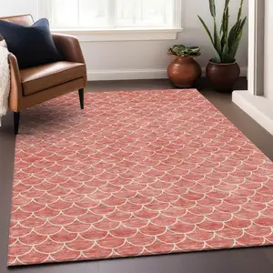 Photo of Salmon And Ivory Geometric Washable Area Rug With UV Protection