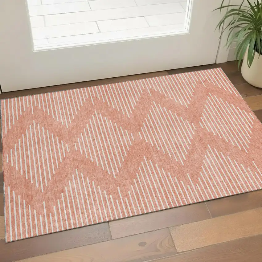 Salmon And Ivory Geometric Washable Area Rug With UV Protection Photo 1