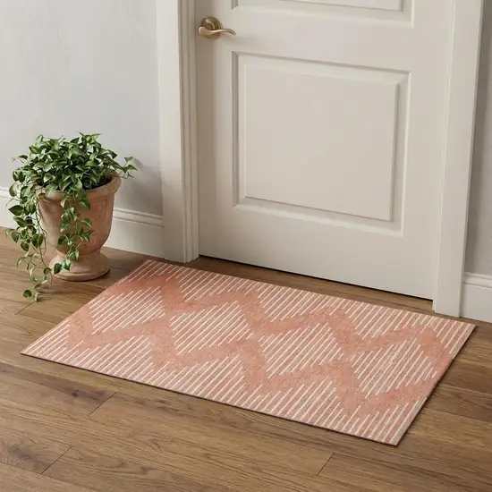 Salmon And Ivory Geometric Washable Area Rug With UV Protection Photo 1