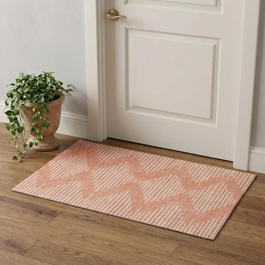 Salmon And Ivory Geometric Washable Area Rug With UV Protection Photo 1
