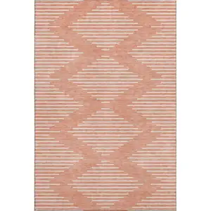 Photo of Salmon And Ivory Geometric Washable Area Rug With UV Protection