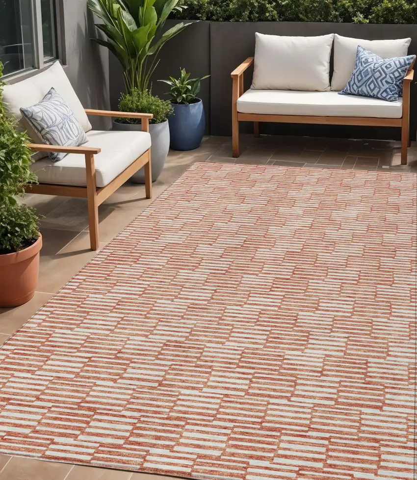 Salmon And Ivory Geometric Washable Indoor Outdoor Area Rug Photo 1
