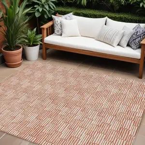 Photo of Salmon And Ivory Geometric Washable Indoor Outdoor Area Rug