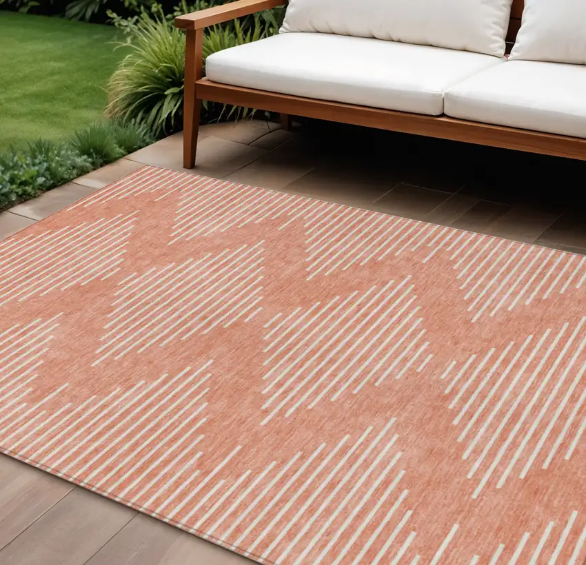 Salmon And Ivory Geometric Washable Indoor Outdoor Area Rug Photo 1
