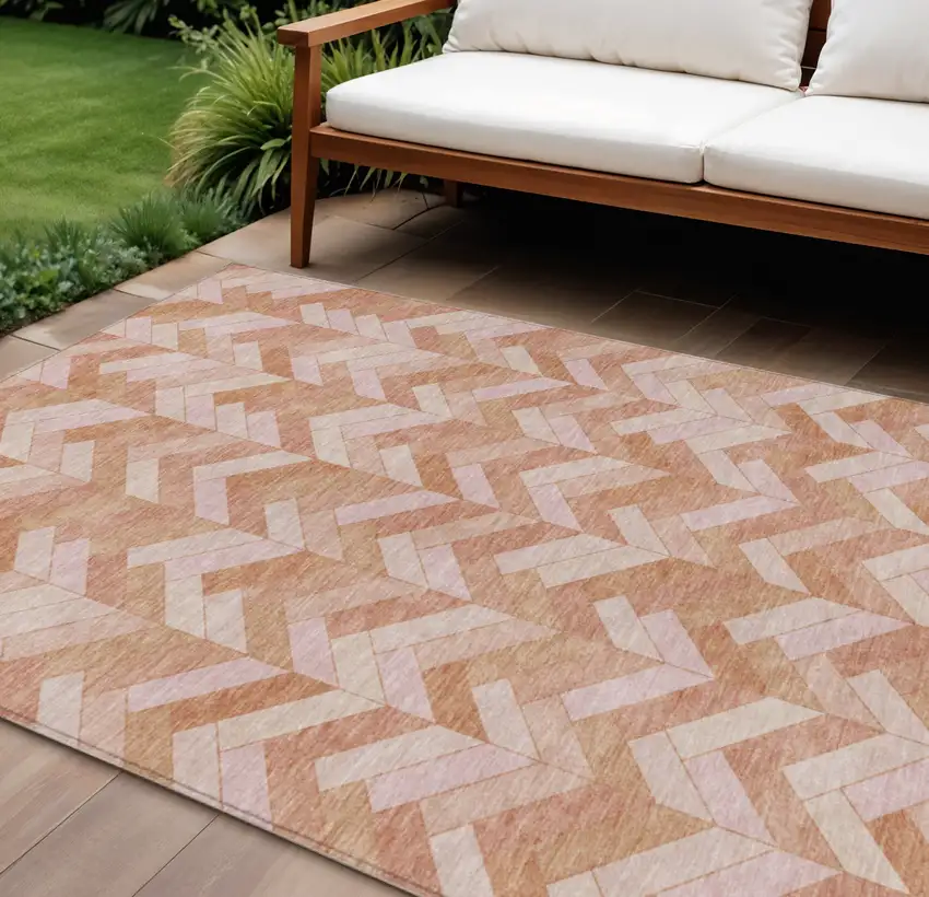 Salmon And Ivory Geometric Washable Indoor Outdoor Area Rug Photo 1