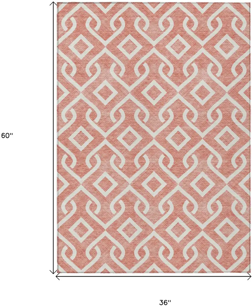 Salmon And Ivory Geometric Washable Indoor Outdoor Area Rug Photo 3