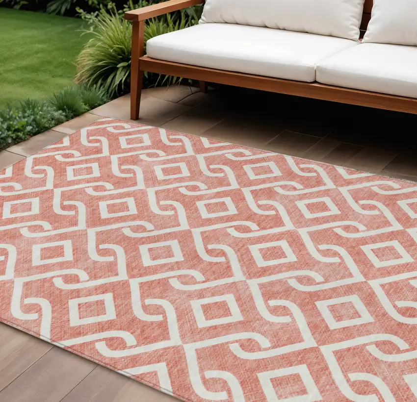 Salmon And Ivory Geometric Washable Indoor Outdoor Area Rug Photo 1