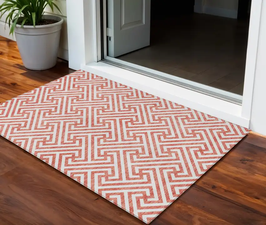 Salmon And Ivory Geometric Washable Indoor Outdoor Area Rug Photo 1