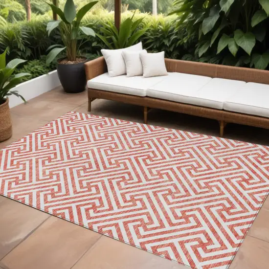 Salmon And Ivory Geometric Washable Indoor Outdoor Area Rug Photo 1