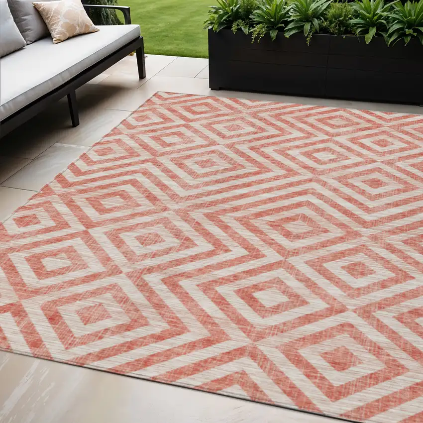 Salmon And Ivory Geometric Washable Indoor Outdoor Area Rug Photo 1