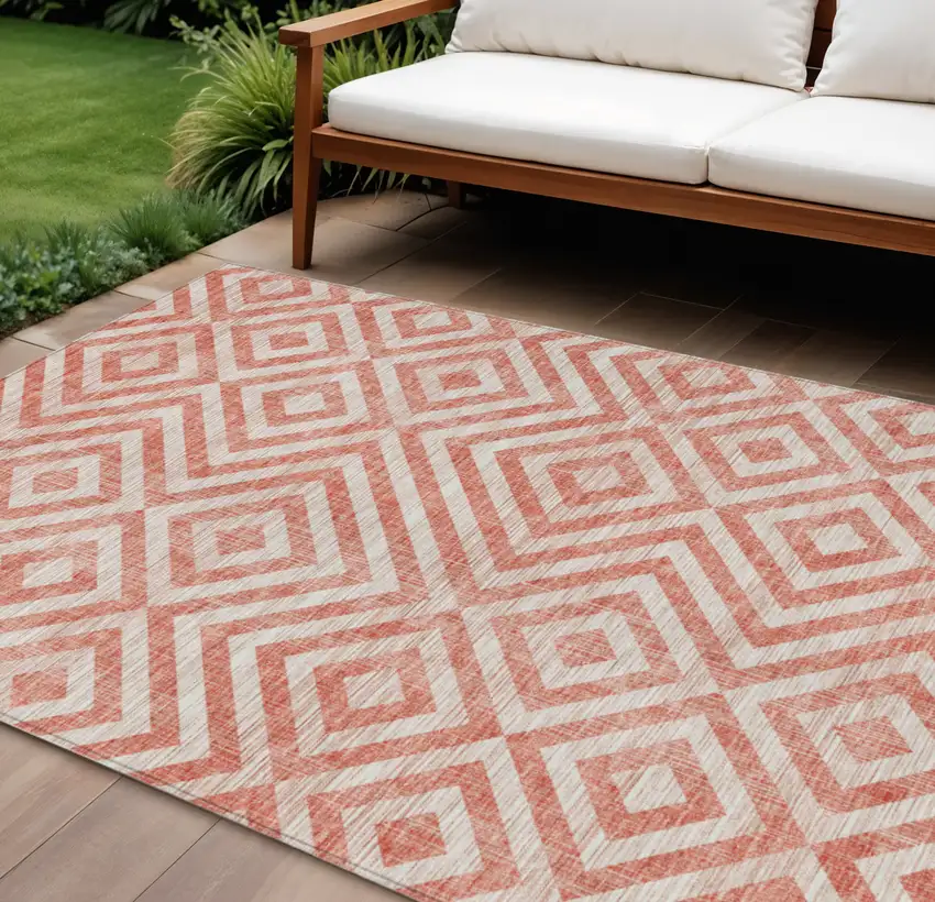 Salmon And Ivory Geometric Washable Indoor Outdoor Area Rug Photo 1