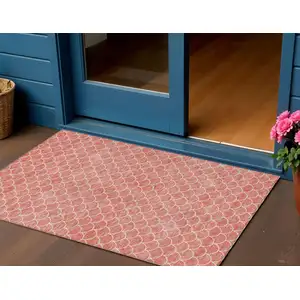 Photo of Salmon And Ivory Geometric Washable Indoor Outdoor Area Rug