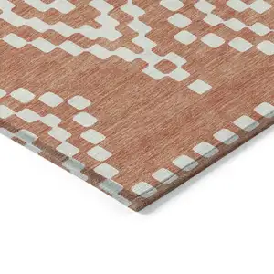 Photo of Salmon And Ivory Geometric Washable Indoor Outdoor Area Rug