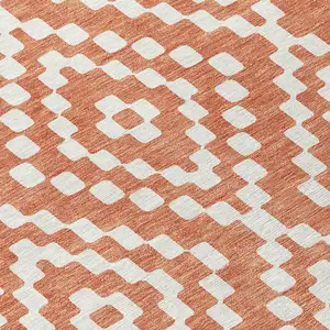 Photo of Salmon And Ivory Geometric Washable Indoor Outdoor Area Rug