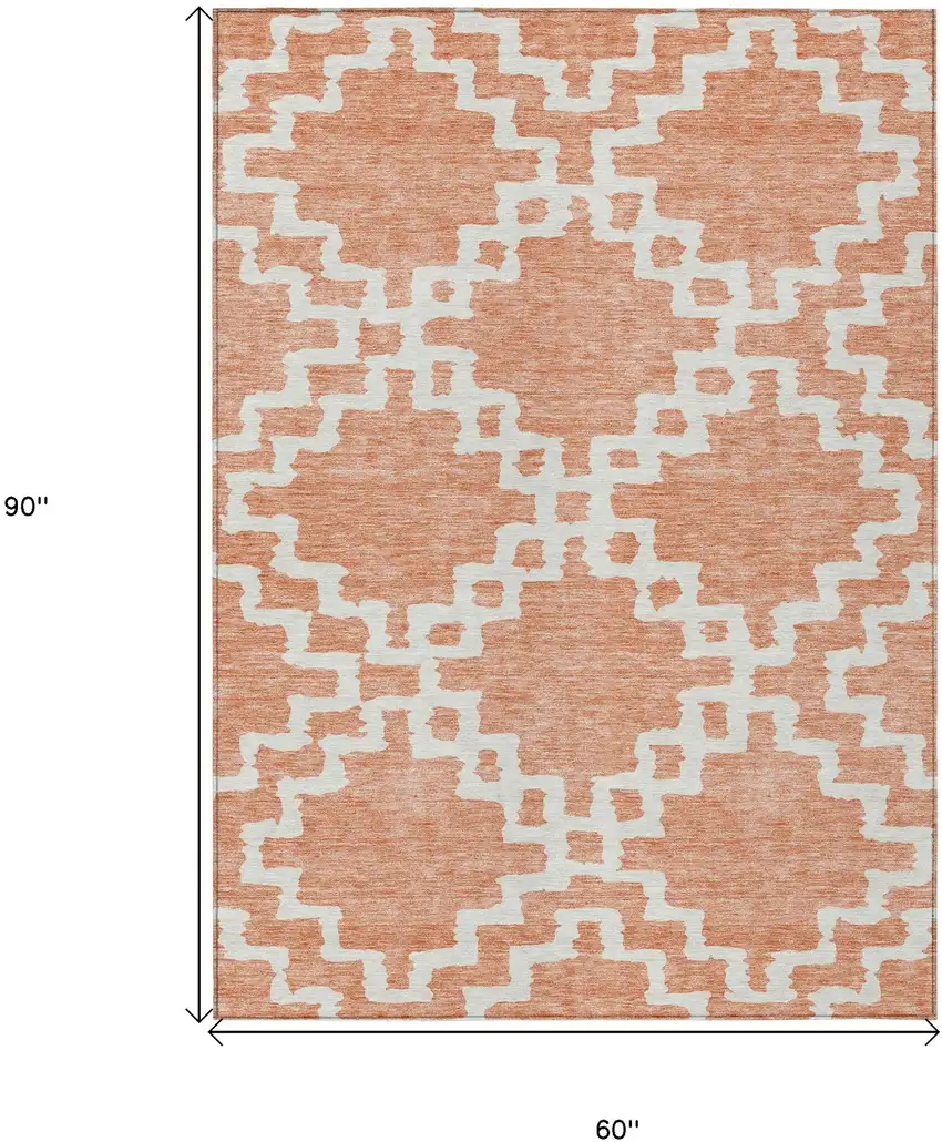 Salmon And Ivory Geometric Washable Indoor Outdoor Area Rug Photo 3