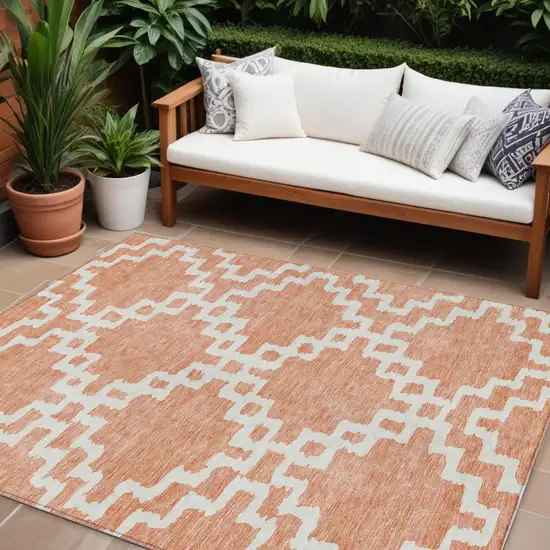 Salmon And Ivory Geometric Washable Indoor Outdoor Area Rug Photo 1